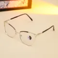 Elegant cat-eye metal glasses frames with rhinestone detailing and two-tone temples. - Gold and Tea Frame - Photochromic Lens