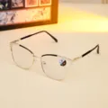 Fashionable cat-eye metal glasses frame with rhinestone details and photochromic lenses - Black and Gold Frame - Photochromic Lens