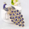 Elegant peacock feather brooch with sparkling blue rhinestones in a vintage gold-toned setting - Deep Blue Gold Style (19)