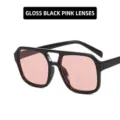 Retro large frame sunglasses with glossy black frame and transparent pink lenses. - Black Frame Pink Lens