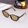Stylish vintage cat-eye sunglasses featuring black frame and tea lenses for fashion - Bright Black Tea