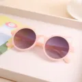 Stylish pink children's sunglasses featuring cute cat ear frames and tinted round lenses. - Jelly Pink Double Grey Lens