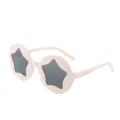 Lunettes de soleil roses rondes pour enfants avec découpes en forme d'étoile pour les petits - Rose