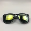 Stylish retro oversized square sunglasses featuring black frames and gold mirrored lenses - Glossy Black Frame / Green Mirrored