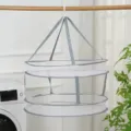 Professional foldable 2-layer mesh laundry drying rack hanging next to a washing machine. - Layered Style / Large (Diameter 55cm)