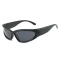 Occhiali da sole sportivi avvolgenti cat-eye neri, design alla moda e trendy per donna - montatura nera con lenti grigie