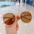 Stylish pink cat-ear UV400 children's sunglasses with round brown lenses for girls. - Lotus Pink