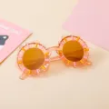 Stylish orange sunflower-shaped sunglasses for kids with UV protection and colorful accents - Jelly Tea Frame Sunflower