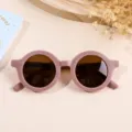 Gafas de sol redondas de color púrpura mate para niños con protección UV400 efectiva - Rosa Empolvado