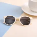 Cute round frame children's sunglasses in cream beige color for fashion party wear - Beige