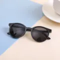 Classic black round frame children's sunglasses with dark lenses for daily style - Black