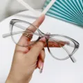 Elegantes gafas de ojo de gato gris transparente con filtro azul para moda y protección ocular - Marco Gris Transparente Lente Blanco