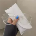 Detailed view of transparent oversized square glasses with a white leather case - Transparent Frame Blue Film Plain Lens / Clear