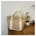 Bolso de mano minimalista de paja tejida con asas de lona blanca para vacaciones de verano - Blanco Roto