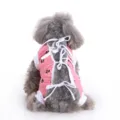 Pink pet surgery recovery suit with cute black paw print pattern and white tie straps for dogs. - XS / Pink