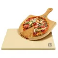 Pizza stone and wooden peel detail shot, heat resistant baking board for homemade pizza and bread. - 2-Piece Set Square Baking Board with Wooden Spatula