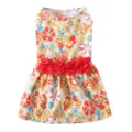 Détail de robe florale pour animal avec tissu respirant, imprimé coloré et fleur rouge. - XS / Coloré