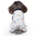 Back view of a dog wearing white pajamas with colorful rainbow and cloud prints. - Rainbow (SY58)