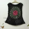 Handmade crochet black sleeveless women top with pink floral appliqué and green fringe trim. - One Size / Black