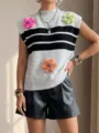 Sleeveless knitted vest with stylish colorblock stripes and charming 3D floral crochet details. - S / Tops / Gray