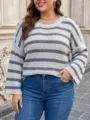 Close-up of plus size striped knit sweater featuring shoulder buttons and wide sleeves - 0XL/L / Tops / Gray