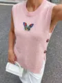 Close-up of pink knit vest with vibrant sequin butterfly patch detail - S / Tops / Pink