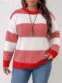 Close-up of a stylish red and white striped knit sweater worn by model for daily wear. - S / Bright Red