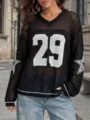 Detalle de una camiseta de punto calado negra estilo jersey con el número 29 blanco - S / Tops / Negro y Blanco