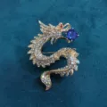 Detailed view of a vintage dragon brooch with sparkling white and blue rhinestones - Blue Dragon