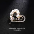 Detailed view of heart-shaped brooch with white pearls and rhinestones on black background - Hollow Heart Style (Style 3)