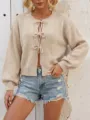 Stylish beige tie front knit cardigan paired with distressed denim shorts for women. - S / Apricot