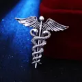 Retro Silber Caduceus Brosche Anstecknadel mit Engelsflügeln und Schlangen - Antiksilber