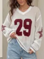 Detalle de top de punto de malla blanco con estampado deportivo número 29 rojo y estrellas - S / Tops / Blanco y Rojo