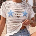 White crochet knit beach cover-up featuring blue hand-crocheted starfish appliques. - S / Tops / White
