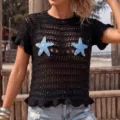 Elegant black hollow-out crochet beach cover-up featuring blue starfish hand-knitted appliqués - S / Tops / Black