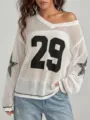 Detalle de la textura del top de malla blanca con el número 29 y estrellas - S / Tops / Blanco y Negro