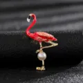 Detailed view of the vibrant pink flamingo brooch with gold finish and white pearl - Style 4 (Magenta Enamel Flamingo)