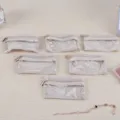 Set of 6 beige mini jewelry storage pouches with clear PVC window and gold zipper - Single Inner Bag / 10.3x6.3x0.5cm