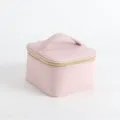 Elegant pink faux leather portable jewelry box with top handle and gold zipper - Pink