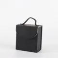 Portable black PU leather jewelry storage box with top handle for travel organization - Black