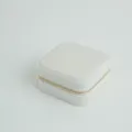 Elegant square velvet jewelry storage box with a gold zipper in a soft light grey finish - Square / White