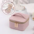 Elegant pink PU leather jewelry box with handle for portable earring and ring storage. - 12x12x7cm / Pink PU