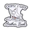 Funny white goose sitting on books enamel pin featuring OOPS I GOT ANOTHER BOOK quote - Reading White Goose (QHXZ6727)