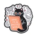 Funny cartoon black cat enamel pin wearing glasses reading a book with English text - Reading Cat (UVXZ532)