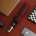 Ombrello pieghevole automatico bordeaux da uomo, doppio uso pioggia e sole, resistente. - Borgogna