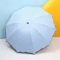 Large light blue and white striped sun and rain umbrella with wave edges. - 10-Bone Striped / Light Blue