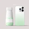 Mini Faltregenschirm mit Farbverlauf in Grasgrün neben einem Smartphone - Flacher 6-fach Mini-Schirm / Grasgrün Farbverlauf