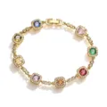 Close-up of gold bracelet featuring multi-color square gemstones and micro-pave crystals. - Gold Multicolor Zirconia