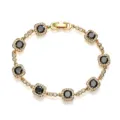 Detailed view of gold copper bracelet with square black and white crystals - Gold Black Zirconia