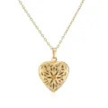 Detailed view of a gold vintage heart locket necklace with intricate sunburst pattern. - Hollow Heart Locket